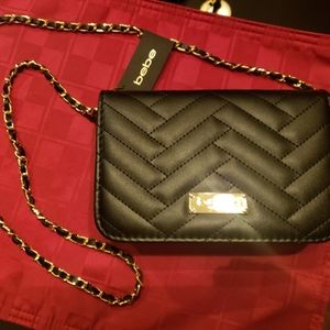 BEBE SOPHIA CROSSBODY PURSE. GOLD CHAIN STRAP. NEW W/TAGS.